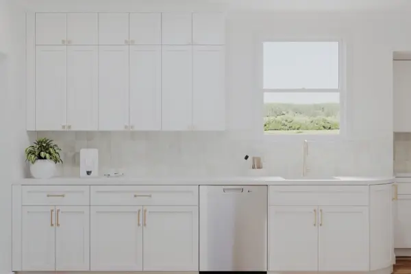 Custom kitchen remodel featuring white cabinetry, quartz countertops, and a bright window over the sink in a Bay Area home