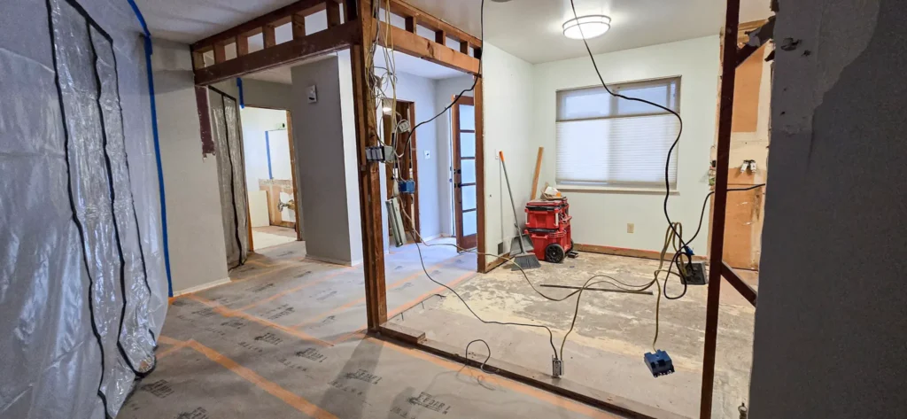 Home renovation in Oakland CA during wall removal and structural framing work