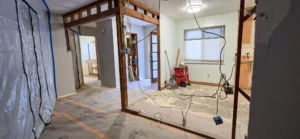 Home renovation in Oakland CA during wall removal and structural framing work