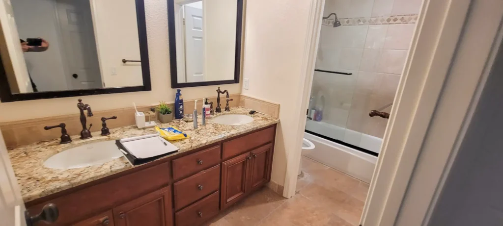 Before photo of double vanity in Pleasanton, CA bathroom prior to full remodel