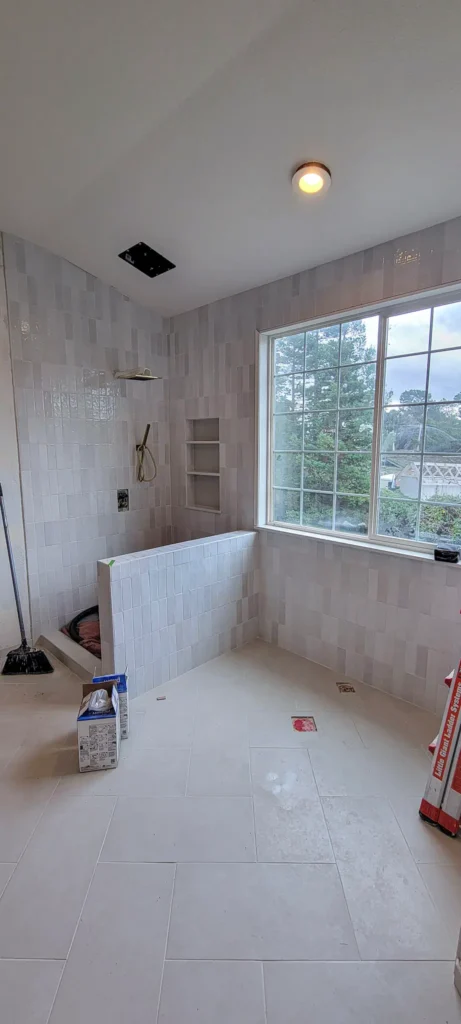 Bathroom tile installation in progress during remodel in Pleasanton, CA