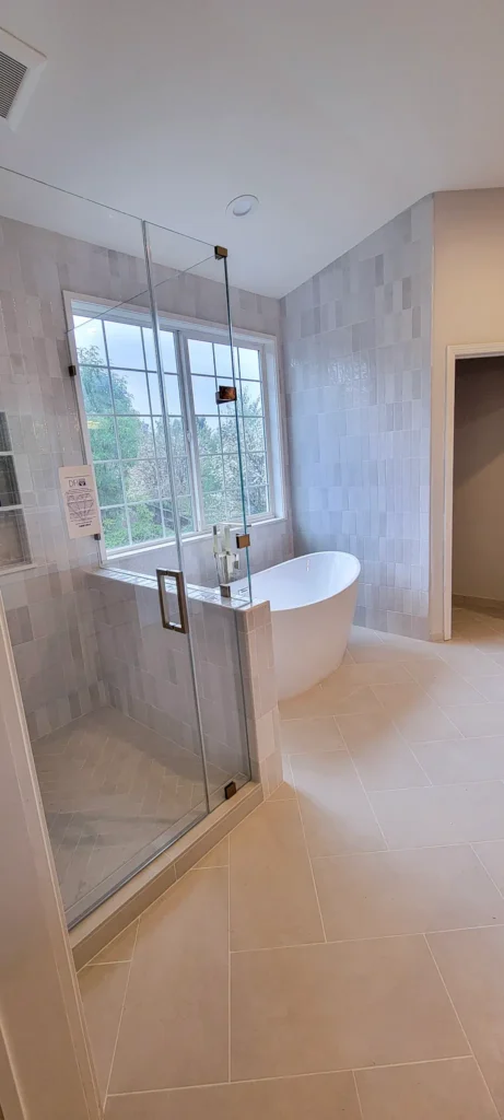 Finished master bathroom remodel in Pleasanton, CA featuring freestanding tub and custom tile shower