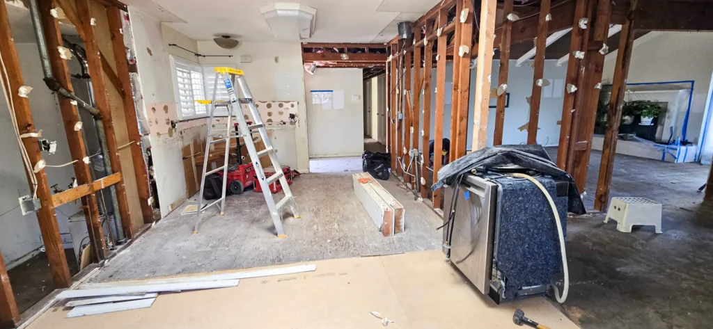 Structural wall removal and demolition phase during full home remodel in Santa Clara, California