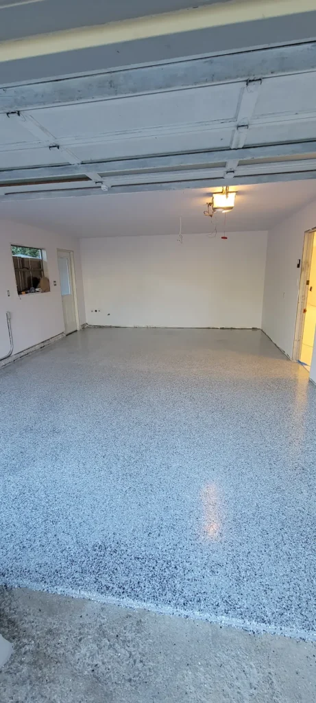 Finished garage remodel with epoxy flake flooring in El Sereno California