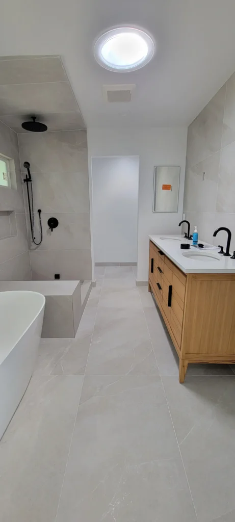 Custom master bathroom addition in Martinez California with walk-in shower, freestanding soaking tub, and modern tile by Lions Gate Remodeling