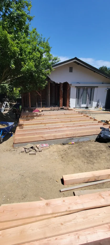 Floor framing for a master suite home addition in Martinez California where the existing home was opened for a new bedroom and bathroom expansion